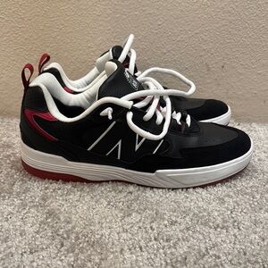 New Balance Black and Red Sneakers with Sporty Design